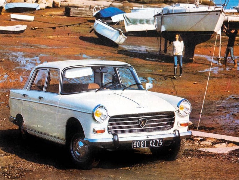 PEUGEOT 404 (berline et break) - Une lionne à l'américaine.